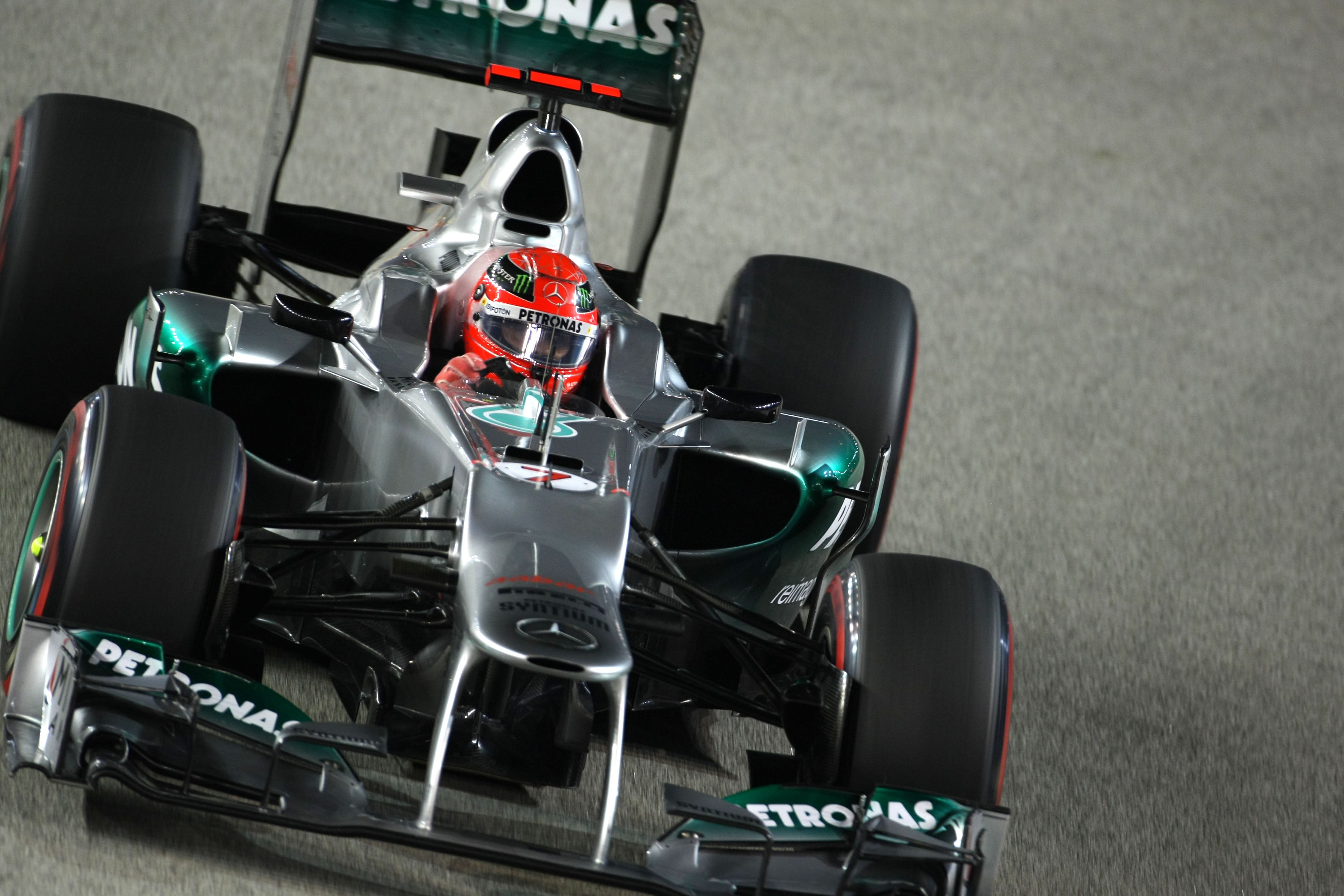 Schumacher moet tien startplaatsen inleveren in Japan