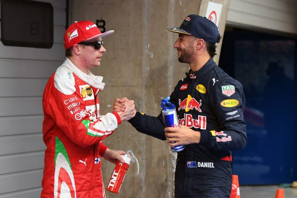 www.sutton-images.com Kimi Raikkonen (FIN) Ferrari and Daniel Ricciardo (AUS) Red Bull Racing celebrate in parc ferme at Formula One World Championship, Rd3, Chinese Grand Prix, Qualifying, Shanghai, China, Saturday 16 April 2016. BEST IMAGE